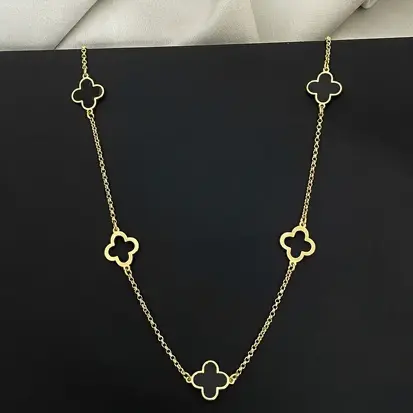 GARGANTILHA 3 TREVO PRETO E 2 VAZADOS DOURADO 50CM